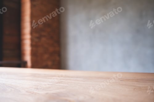Preview: Wooden table top with blurred of concrete wall background