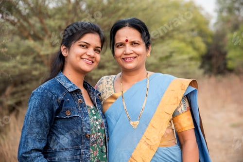 Preview: Happy loving mother and daughter at outdoor