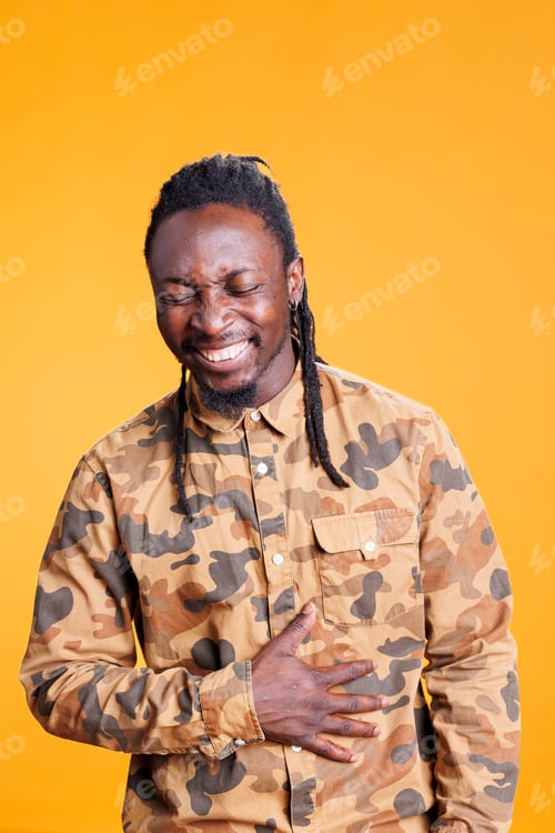 Preview: Adult laughting during studio shot