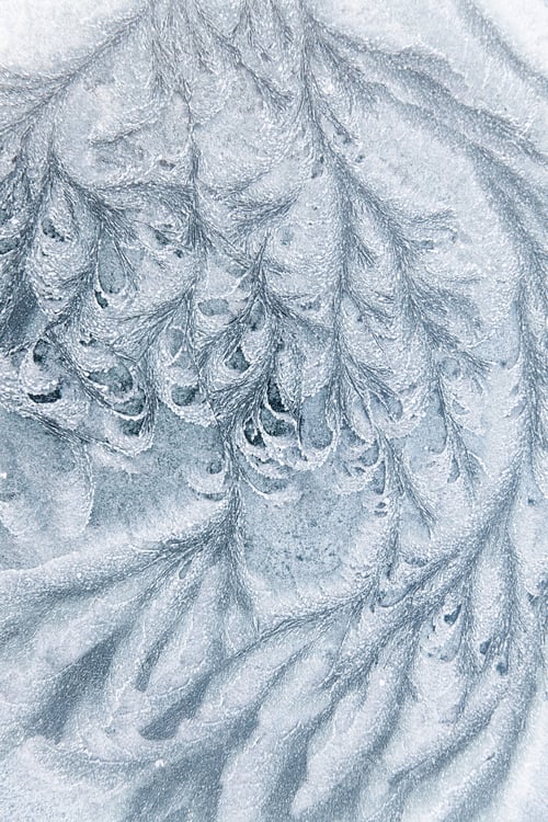 Preview: Abstract ice textures on car window in winter
