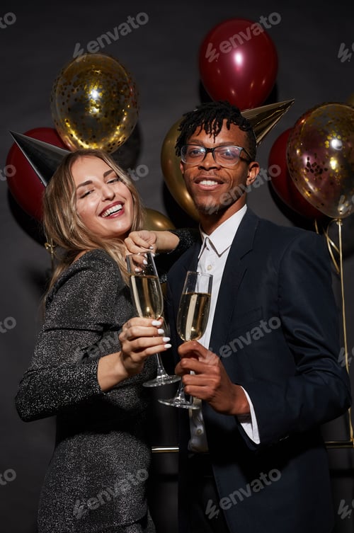Preview: Beautiful Mixed-Race Couple Posing at Party