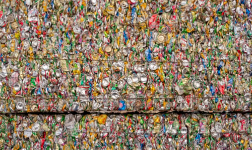 Preview: Blur image of many compressed cans stick together in the workplace of recycle factory