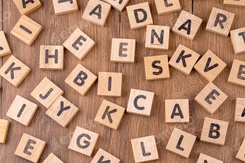 Preview: Alphabets on wooden cubes as a background