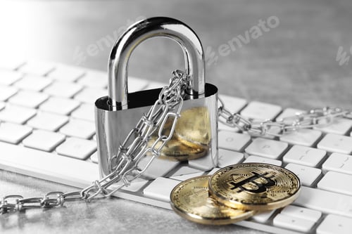 Preview: Cyber safety. Metal padlock, chain, bitcoins and computer keyboard on grey table, closeup