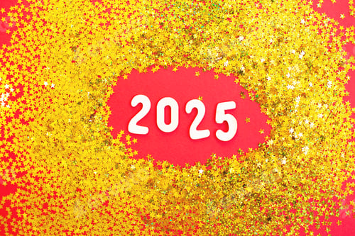 Preview: wooden number 2025 on christmas shiny red background with golden confetti