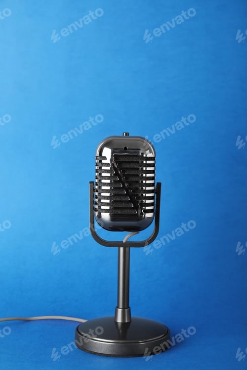 Preview: Retro old style microphone on color background