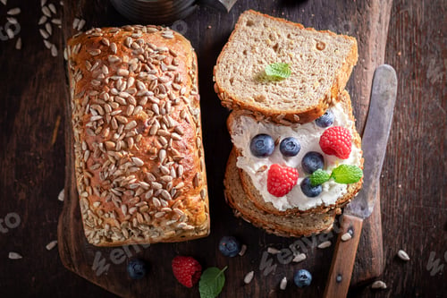 Preview: Homemade and healthy bread for breakfast with fruit and cheese.