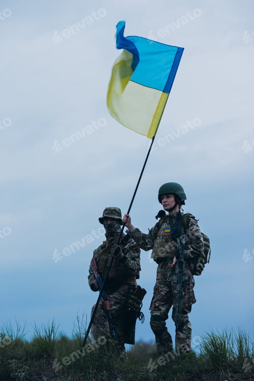 Preview: Ukrainian male and female warriors holding a national flag