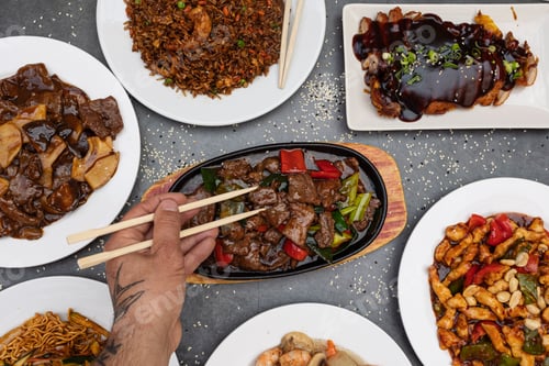 Preview: Oriental food table with various types of Chinese food.