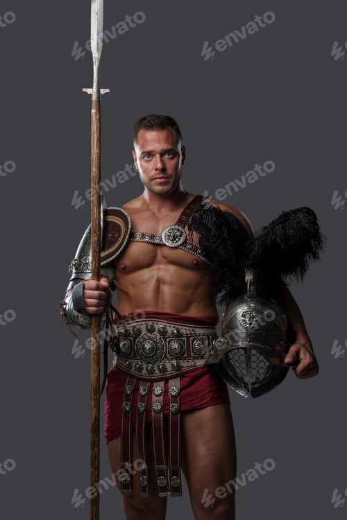 Preview: Gladiator spearman with muscular build against grey background