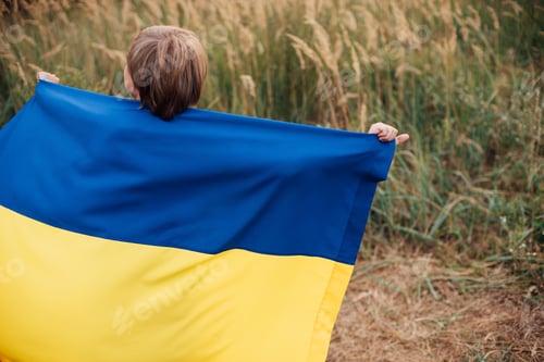 Preview: Ukrainian child boy with yellow and blue flag of Ukraine