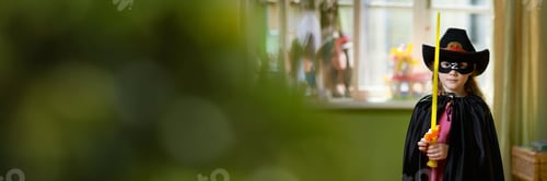 Preview: Child in Costume with Sword Wide Banner