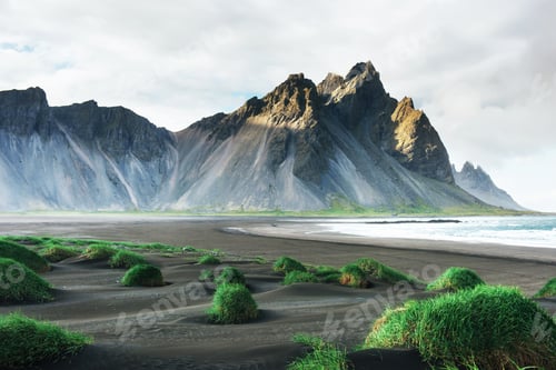 Preview: Fantastic west of the mountains and volcanic lava sand dunes on the beach Stokksness, Iceland