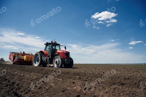 Preview: Riding, side view. Agricultural machinery, tractor on the field. Conception of harvest