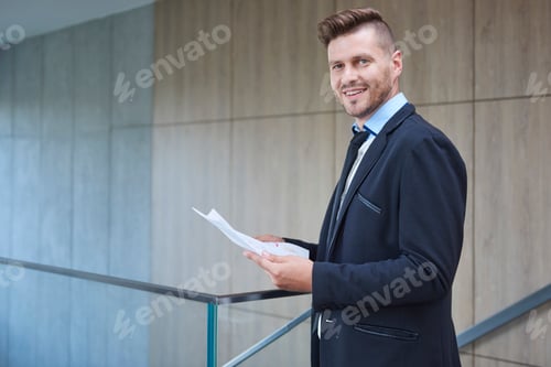 Preview: Man checking some important documents