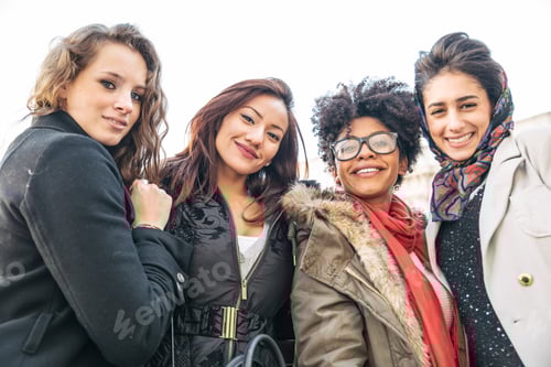 Preview: Four young beautiful girls smiling