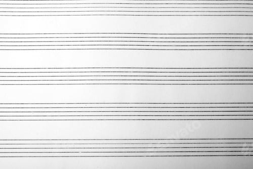 Preview: Paper with empty staves for music notes as background, top view
