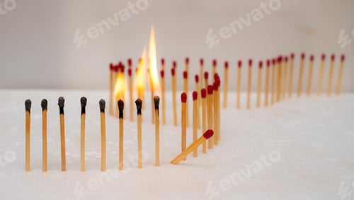 Preview: Row of burning matches and all matches