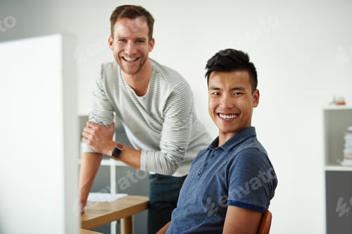 Preview: We never fail to plan. Cropped shot of two designers working together on a project in an office.