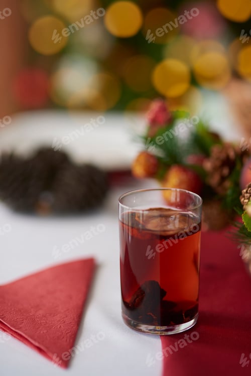 Preview: Glass of compote on Christmas table
