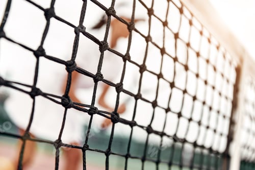 Preview: Woman playing tennis and waiting for the service