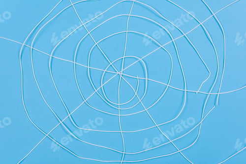 Preview: Abstract spiderweb, white threads on blue background.