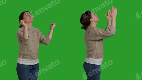 Preview: Close up of religious person posing with prayer hands in studio