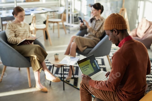 Preview: Black Young Man Doing Marketing Research