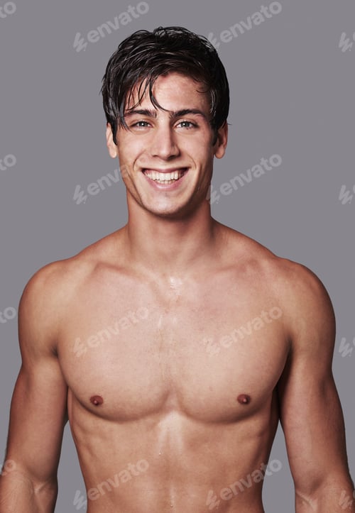 Preview: Portrait of a handsome young shirtless man posing in the studio