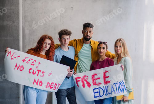 Preview: University students activists protesting indoors, looking at camera fighting for free education