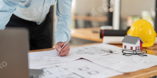 Preview: Architect caucasian male working with laptop and blueprints, engineer inspection in workplace for