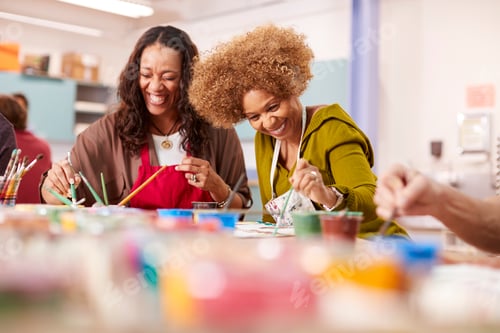 Preview: Two Mature Women Attending Art Class In Community Centre Together