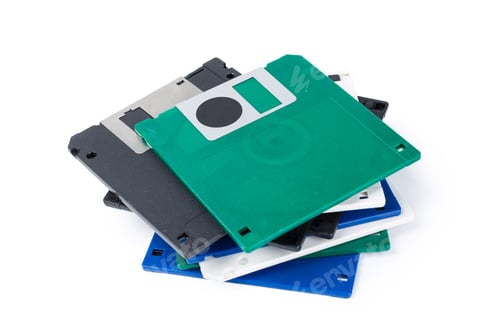 Preview: Old disk storage devices stacked on top of each other in a random arrangement