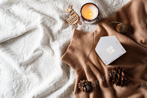 Preview: Cozy warm beige sweater and wooden house flat lay