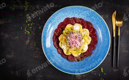 Preview: Spicy salad of herring, beets, potatoes, pickles and red onions. Healthy eating. Top view