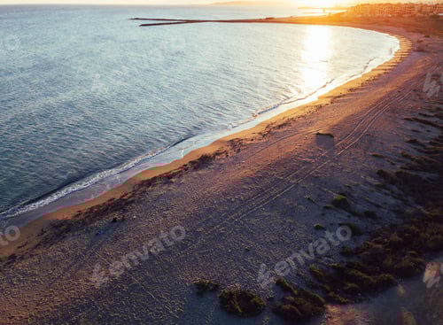 Preview: Aerial views of a girl with her dog at a virgin beach, in Natural park Punta Entinas, Almeria, Spain