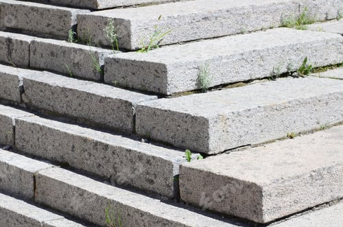 Preview: Concrete staircase at the entrance to the building. Stairs going up diagonally