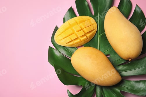 Preview: Flat lay composition with mango fruits on color background. Space for text