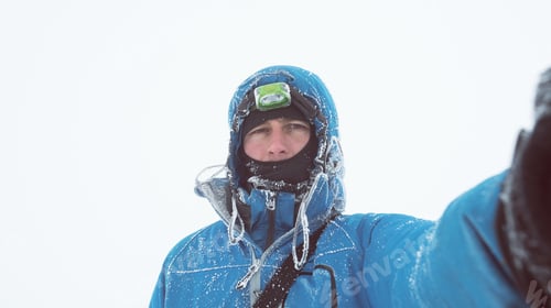 Preview: Winter selfie portrait of a guy with a hoarfrost on the jacket