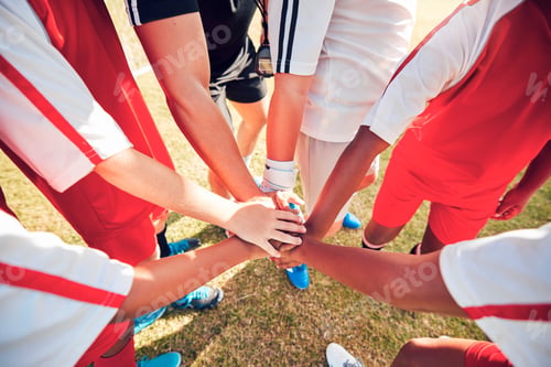 Preview: Teamwork, football and hands of children on field for training, sports and health community. Suppor