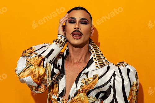 Preview: Portrait of drag queen with fashionable mustache yellow background