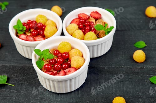 Preview: Healthy breakfast on white bowls.