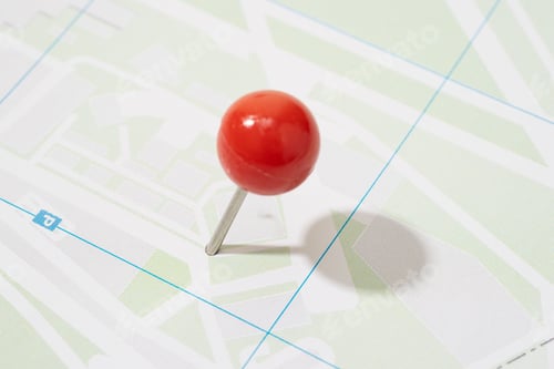 Preview: Red pin thumbtack pinned on a Street Map
