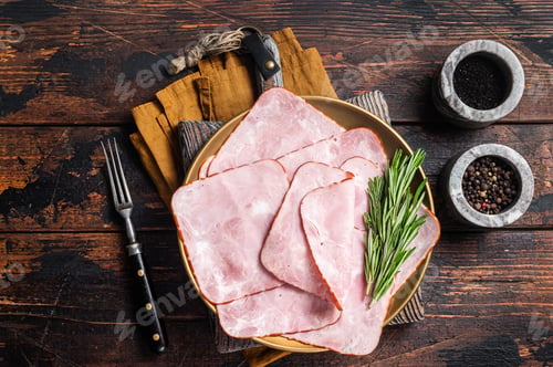 Preview: Square Sliced pork meat ham on plate. Wooden background. Top view