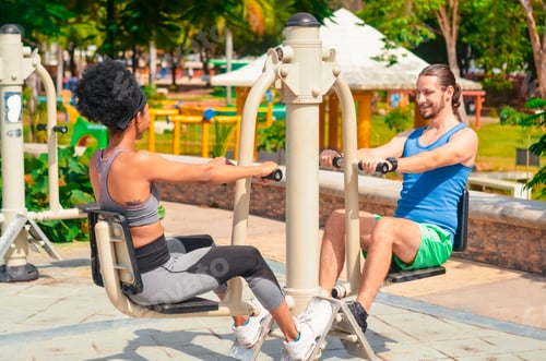 Preview: couple of afro dominican girl and white european guy exercising in the park, multiethnic couple