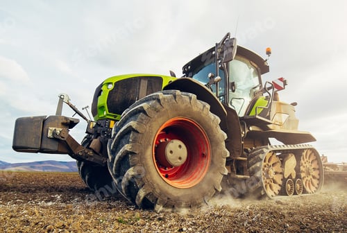 Preview: Modern tractor working on the farm, a modern agricultural transport