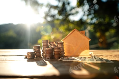 Preview: Saving money home, stacked money and savings house on the table