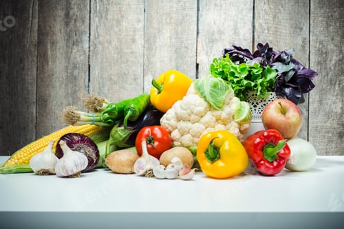 Preview: Beautiful composition of colorful fresh vegetables against grunge wooden background