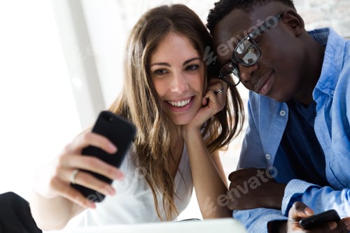 Preview: Portrait of couple taking a selfie with the smartphone