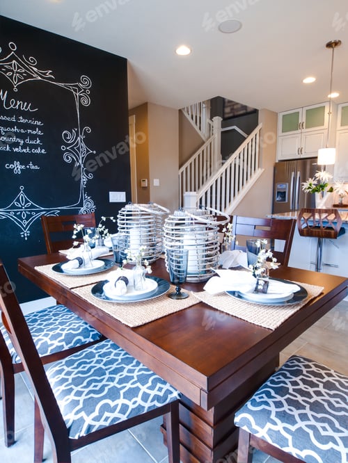Dining Table with Elegant Setting and Menu Board